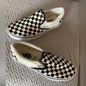 VANS never worn Classic Slip-On in black and white checkerboard. Size 8 men’s